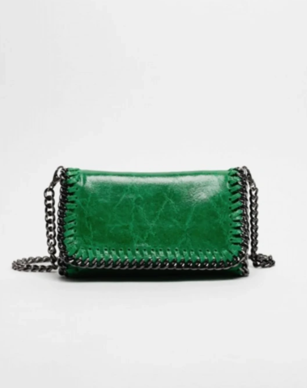 Bolso bandolera de piel verde metalizada, elegante y modera. Compra tu bolso de piel barato online.