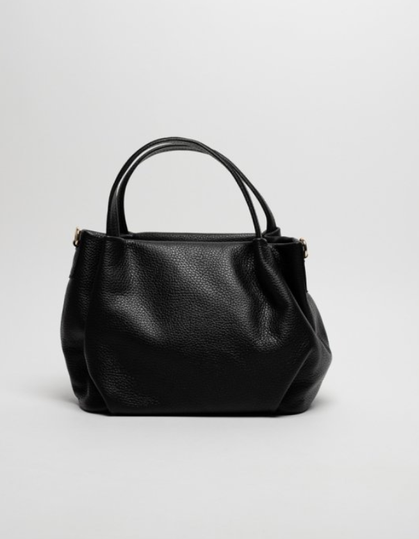 bolso piel vacuno negro, asas fijas y correa. herrajes en doreado