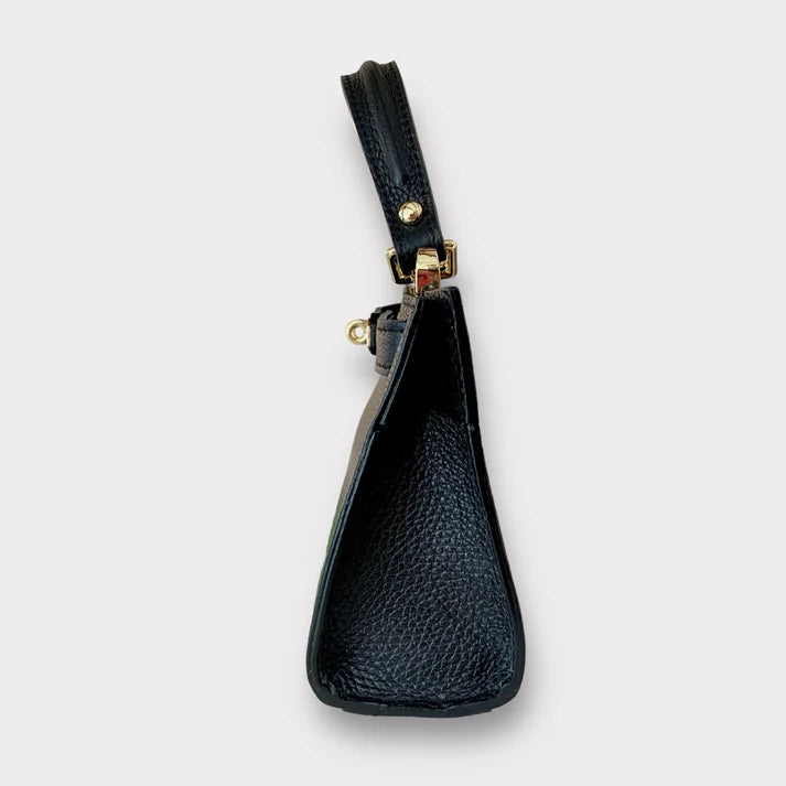 Lateral bolso tote de piel negro, con correa extraible de cuero autentico. estilo new clasico. herrajes dorados