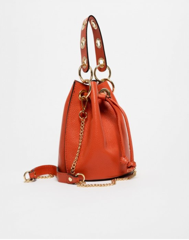 New bag de cuero naranja, diseño de calidad para fiesta. Fabricación cuidada y disponible online en nuestra tienda