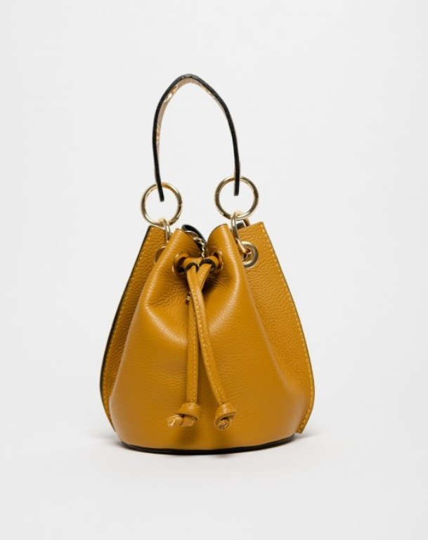 New bag de cuero amarillo, diseño de calidad para fiesta. Fabricación cuidada y disponible online en nuestra tienda