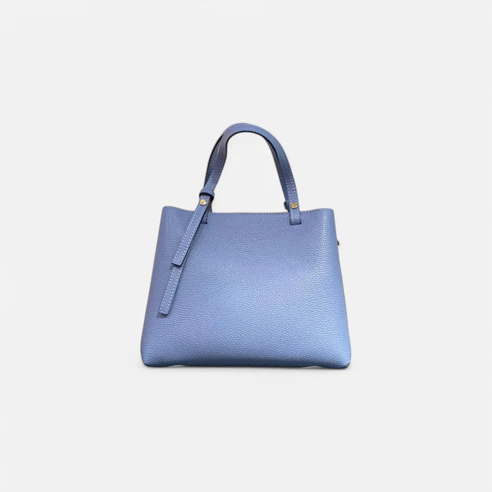 Bolso de piel azul para mujer, diseño minimalista y sofisticado con asas dobles. Elaborado en piel genuina