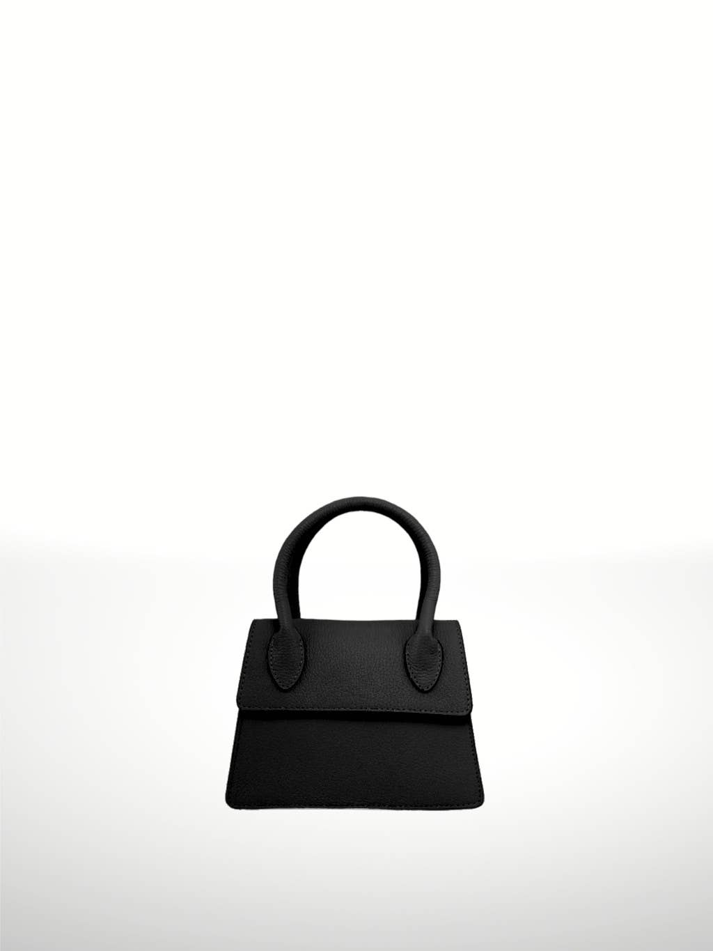 Bolso de piel negra para mujer, elegante diseño de asas rígidas y acabado sofisticado. Compra bolsos de piel online